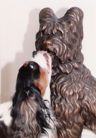 Sebastian licking statue